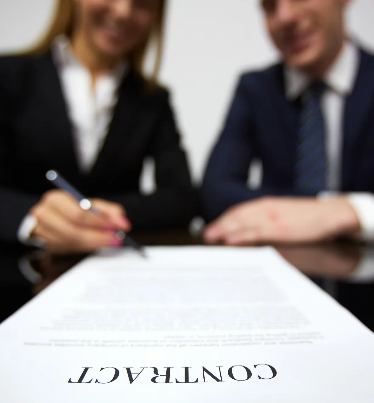 businesswoman signing a new contract