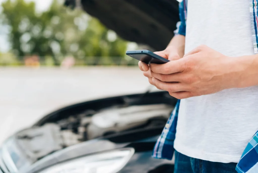 medium shot of man checking phone